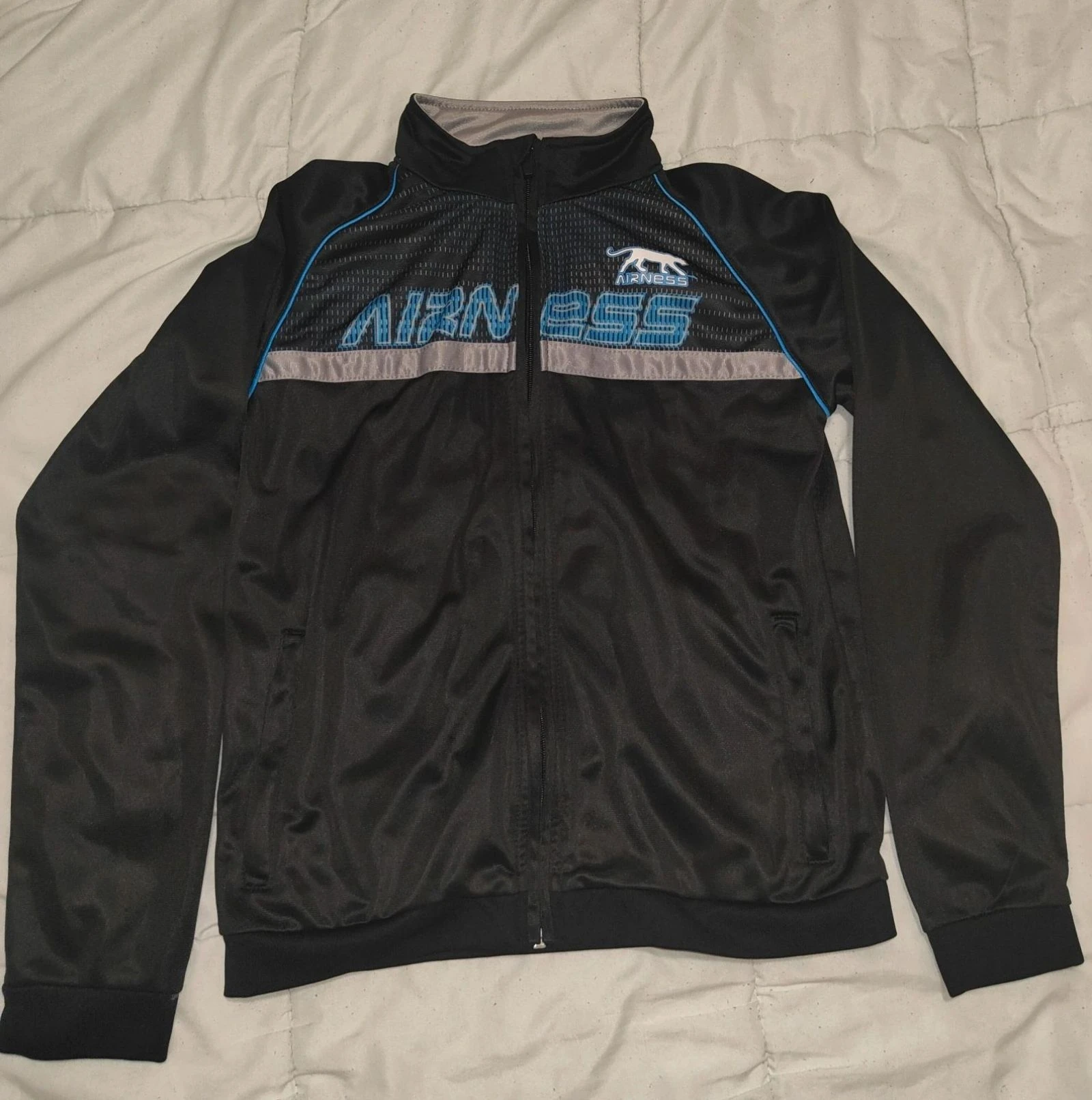 Veste de survêtement zippée Airness noire et bleue Enfant 12 ans